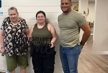 Alex Atamian with clients on closing day
