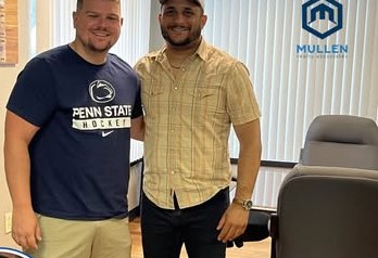 Alex Atamian with clients on closing day