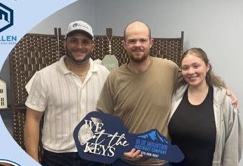 Alex Atamian with clients on closing day