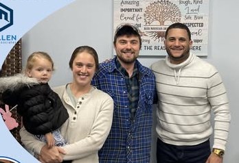 Alex Atamian with clients on closing day