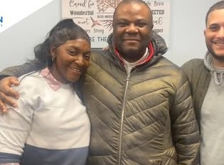 Alex Atamian with clients on closing day